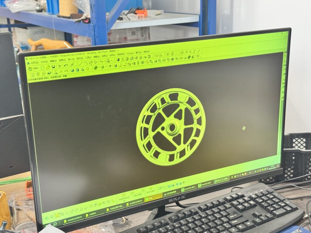3D CAD rendering of a euro-nymphing reel prototype at the factory